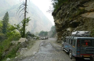 Cloud-covered mountains barkot thumbnail for Yamunotri Gangotri Yatra Package (Ex-Haridwar) 5